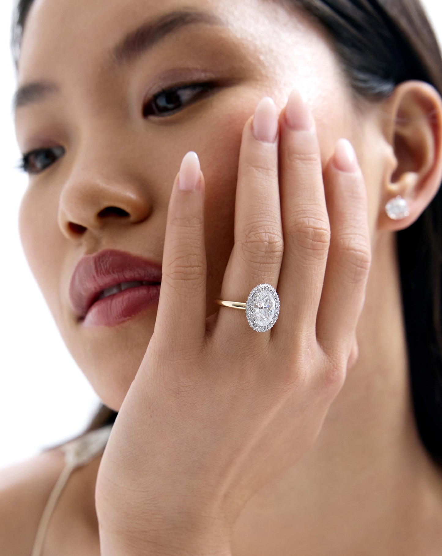 3.10 Oval Lab Diamond in Cloud Bezel with Pavé Halo