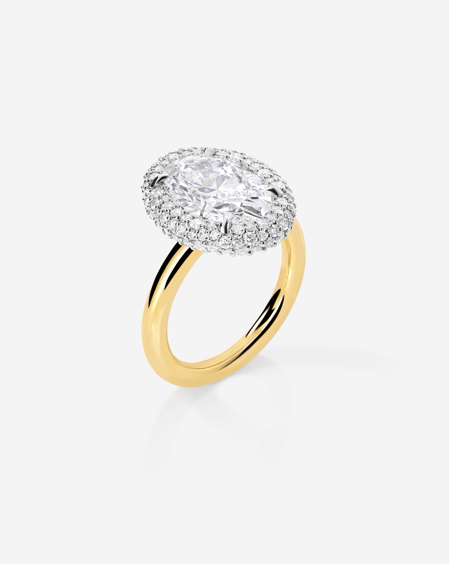 3.10 Oval Lab Diamond in Cloud Bezel with Pavé Halo